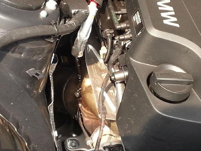 【新买320LI发动机排气管前端发黄属正常否?】