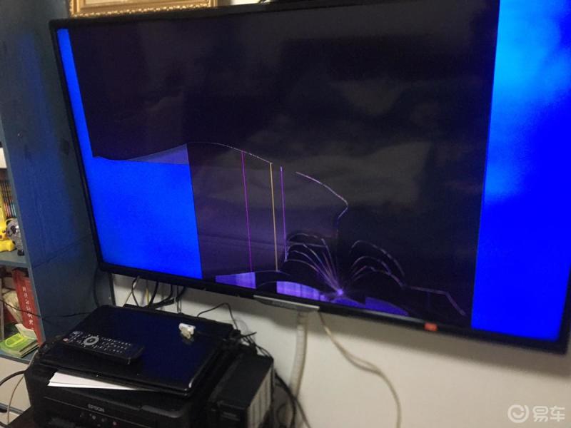 不小心把电视砸了