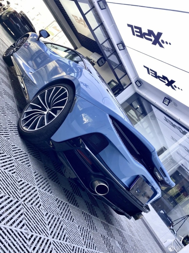 迈凯伦gt 改色风靡各地的瓷器蓝迈凯伦超跑的车型几