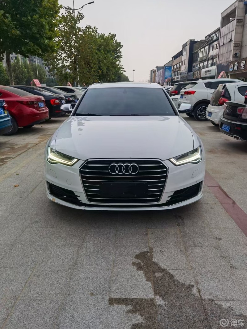 白色的奥迪a6l颜值看着很犀利奥迪不愧有灯场一称灯光确实很棒奥迪a6l