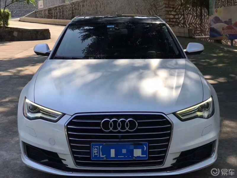 汽车生活 街拍白色的奥迪a6,其实这个颜色并不多见,不过不耽误他的
