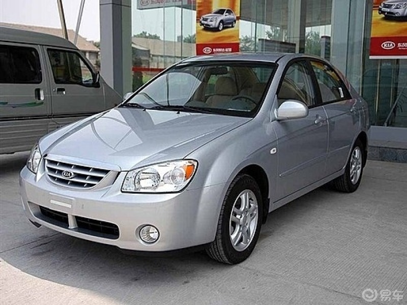 十多年老款赛拉图,看腻了米色的改装了一下,喜欢红色的激情又喜庆,换